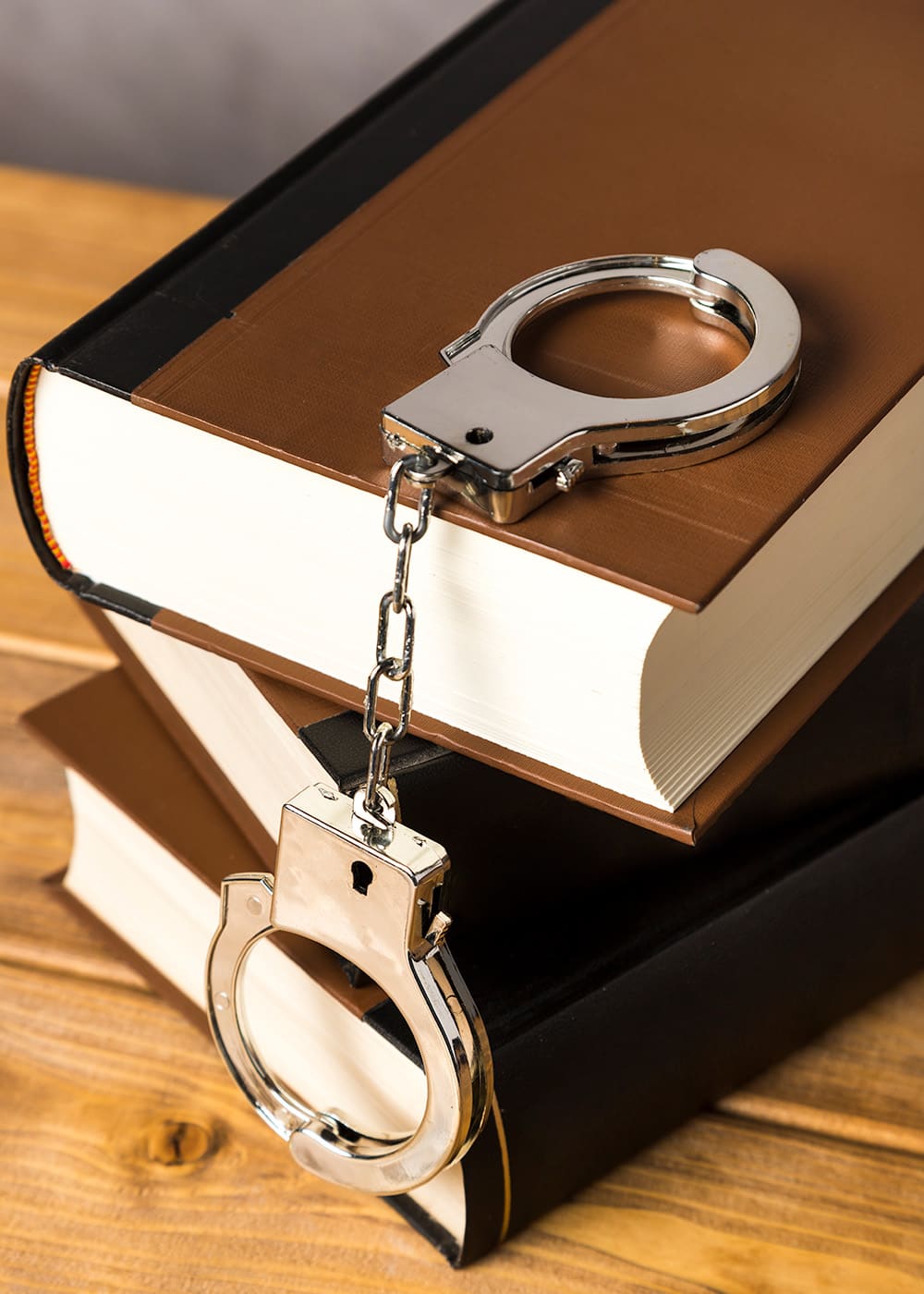 Close Up with handcuffs books